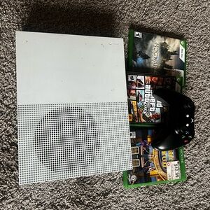 Xbox 360 one (white) and the games